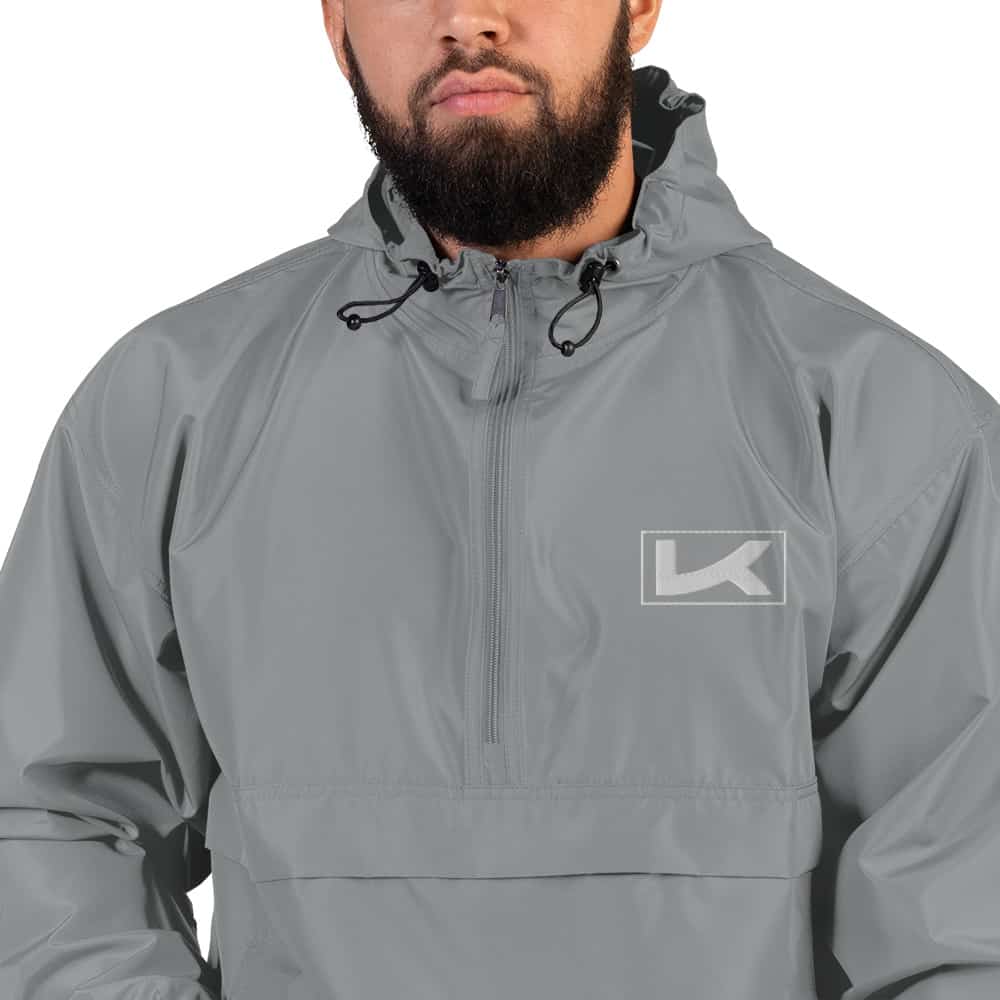 embroidered-champion-packable-jacket-graphite-zoomed-in-619666fe8f23f.jpg