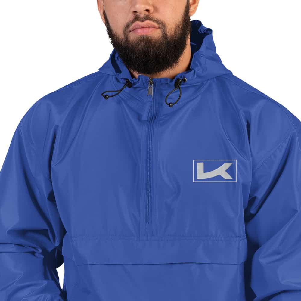 embroidered-champion-packable-jacket-royal-blue-zoomed-in-619666fe8f0db.jpg
